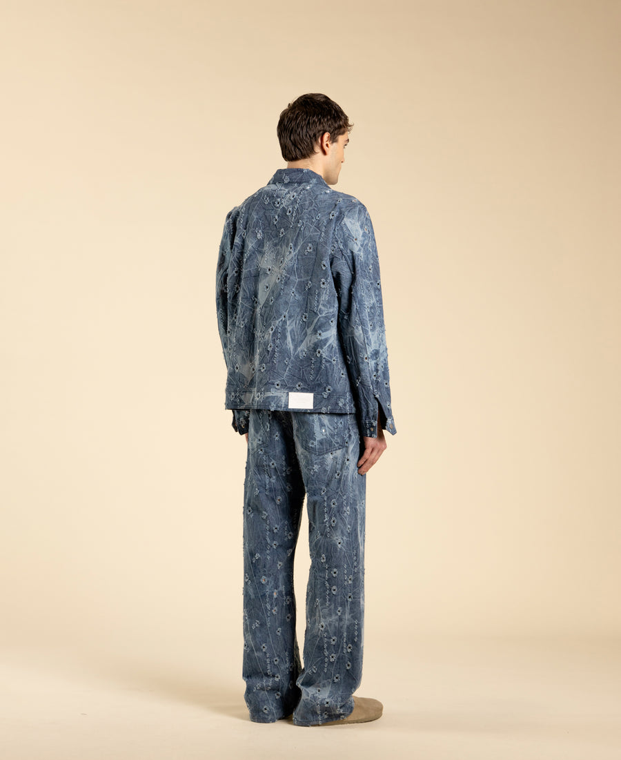 Jeans ampi in denim blu con rotture